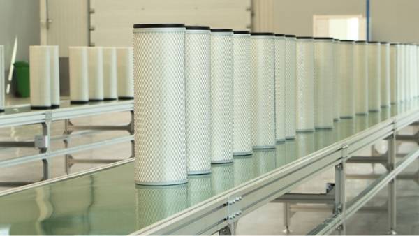 Several air dust collector filter element on the production line.